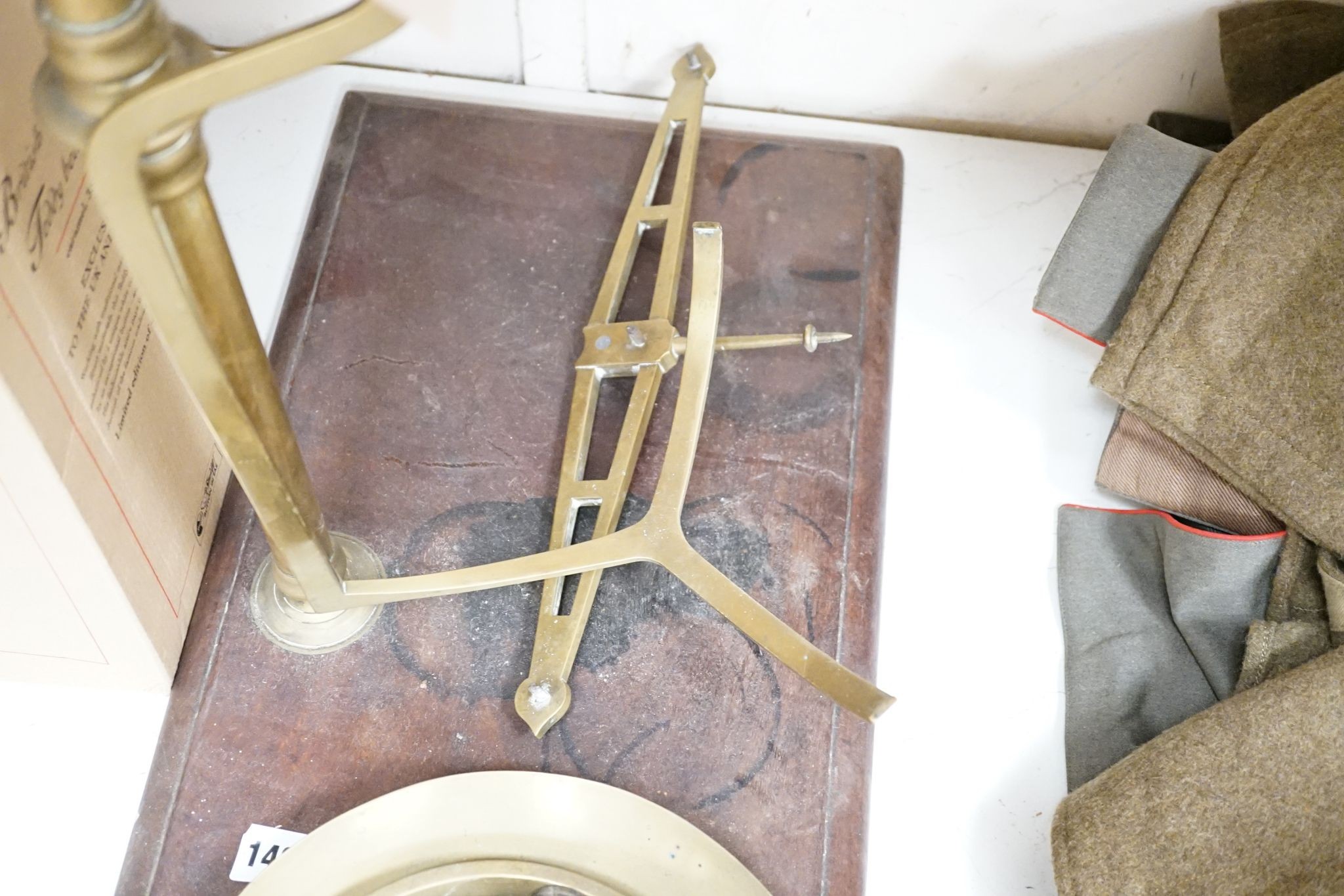 A Victorian brass pan scale., 60 cms high from base.